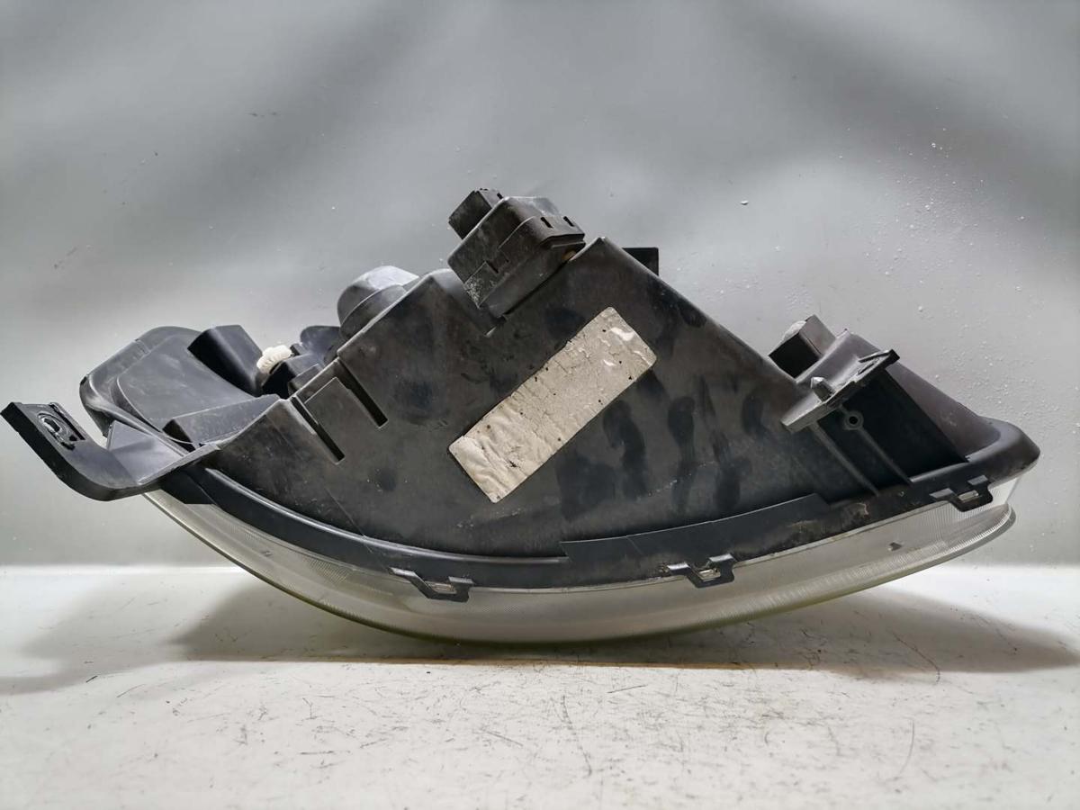 VW Fox original Scheinwerfer vorn links Halogen Bj.2010